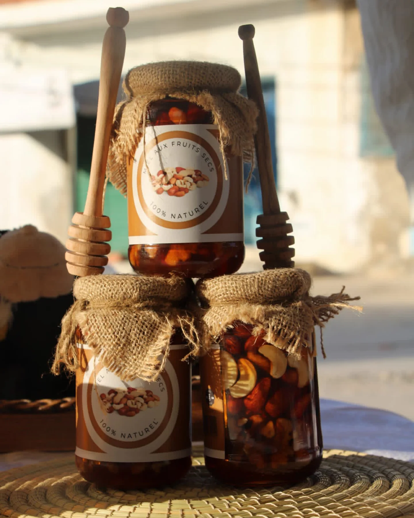 Honey jars with wooden dippers